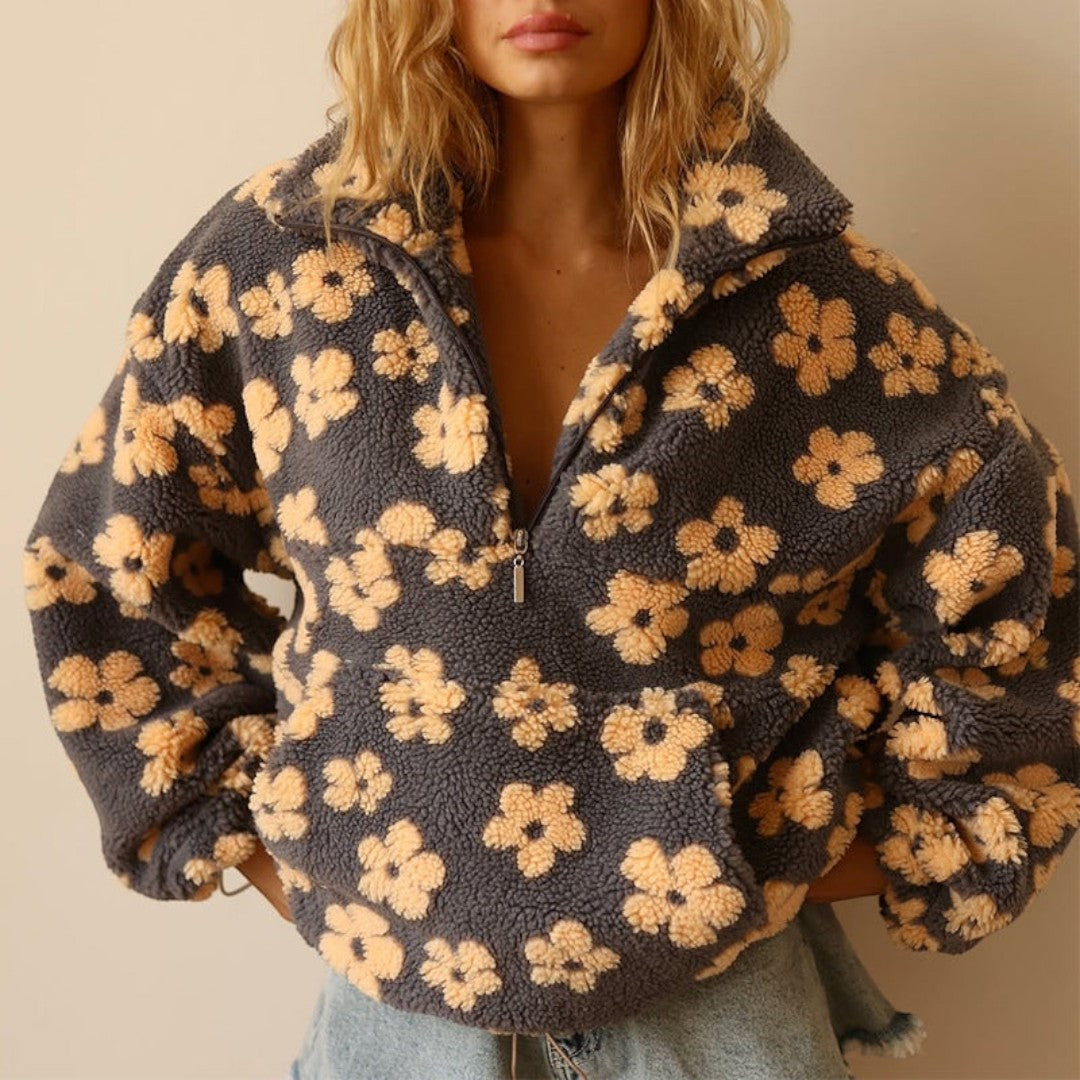 Dames trui met bloemenprint en rits | dagstijl